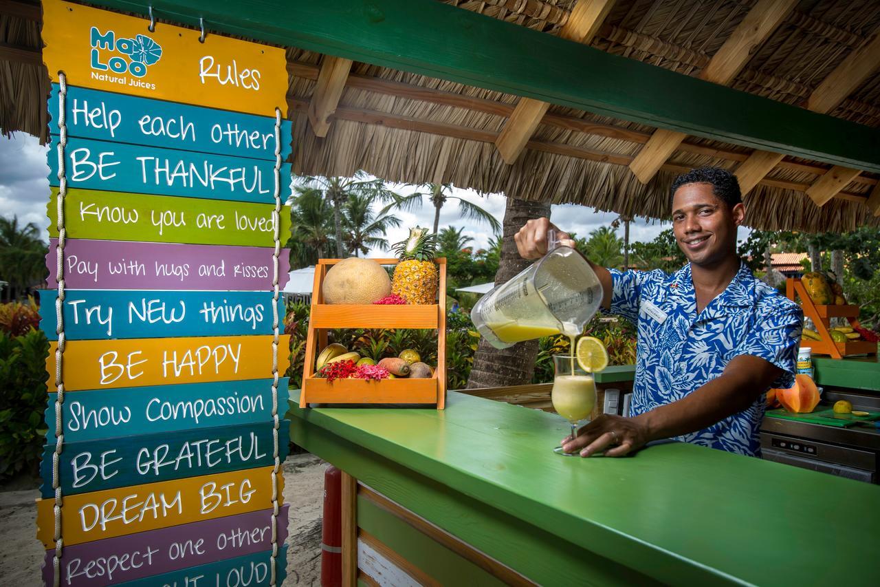 Catalonia Royal La Romana Adults Only Bayahibe Exterior photo A bartender at Sandals Resorts